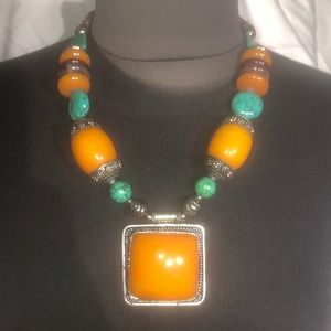 Stone and bead statement necklace with silver tone accents